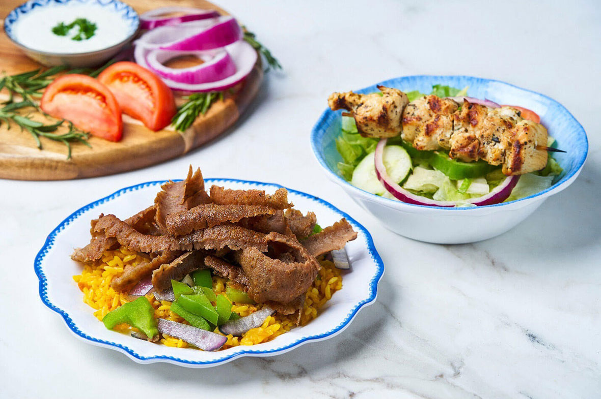 Greek fast casual food plate with gyro meat, souvlaki and fresh salad at Little Greek Fresh Grill Winter Garden FL