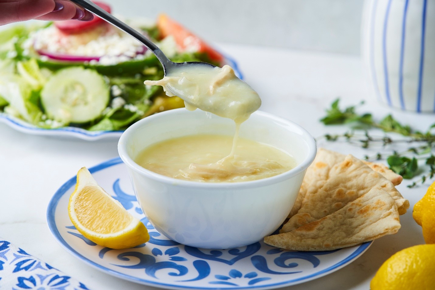 Traditional avgolemono chicken lemon rice soup and Greek salad at Little Greek Fresh Grill Winter Garden FL